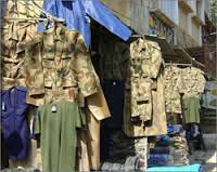 مجلس الوزراء يوجه الدفاع بشراء بدلاتها العسكرية من معمل ألبسة النجف الاشرف