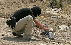 شمال بابل تفكيك عبوتين ناسفتن والعثور على كدس للاعتدة