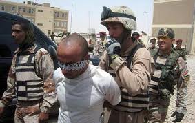 القبض على 15 متهما بينهم ارهابي وهارب من سجن بادوش في البصرة