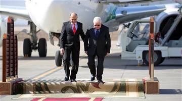الرئيس العراقي يصل طهران ويستقبله وزير الصناعة الايراني
