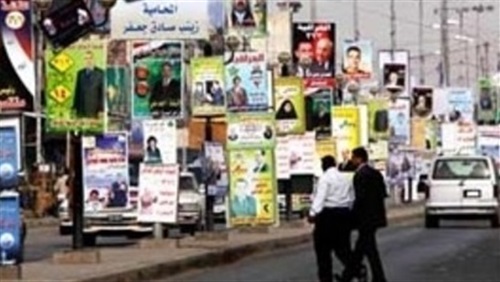 حرامية وخونة صورهم تملأ شوارع بغداد والمحافظات