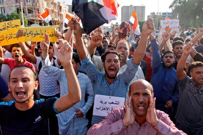 مسؤول:الأحزاب والمليشيات تجبر المواطنين في الأحياء الراقية داخل بغداد على بيع منازلهم