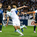 المنتخب العراقي باللون الأبيض في مواجهته مع اليابان
