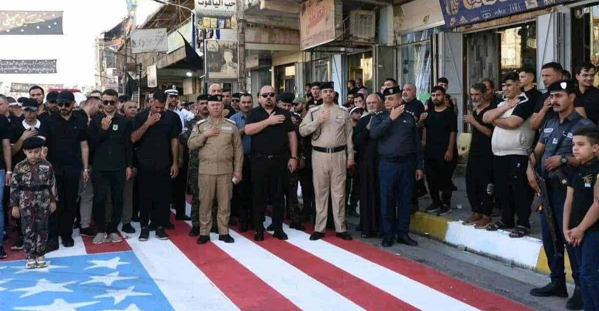 مصدر أمني:وزير الداخلية يعاقب ضباط دعسوا على العلم الأمريكي