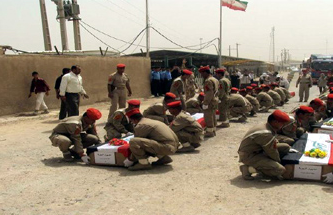 العراق يسلم 133 رفاتاً إيرانيا ويتسلم 20 لجنود عراقيين