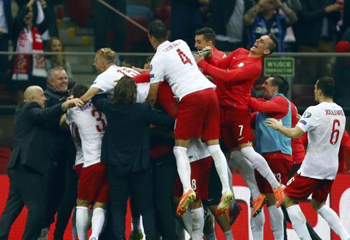 بطل العالم يسقط أمام بولندا في تصفيات أوروبا