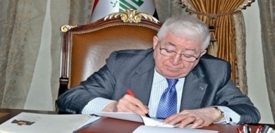 الرئيس العراقي يصادق على قانون العمل